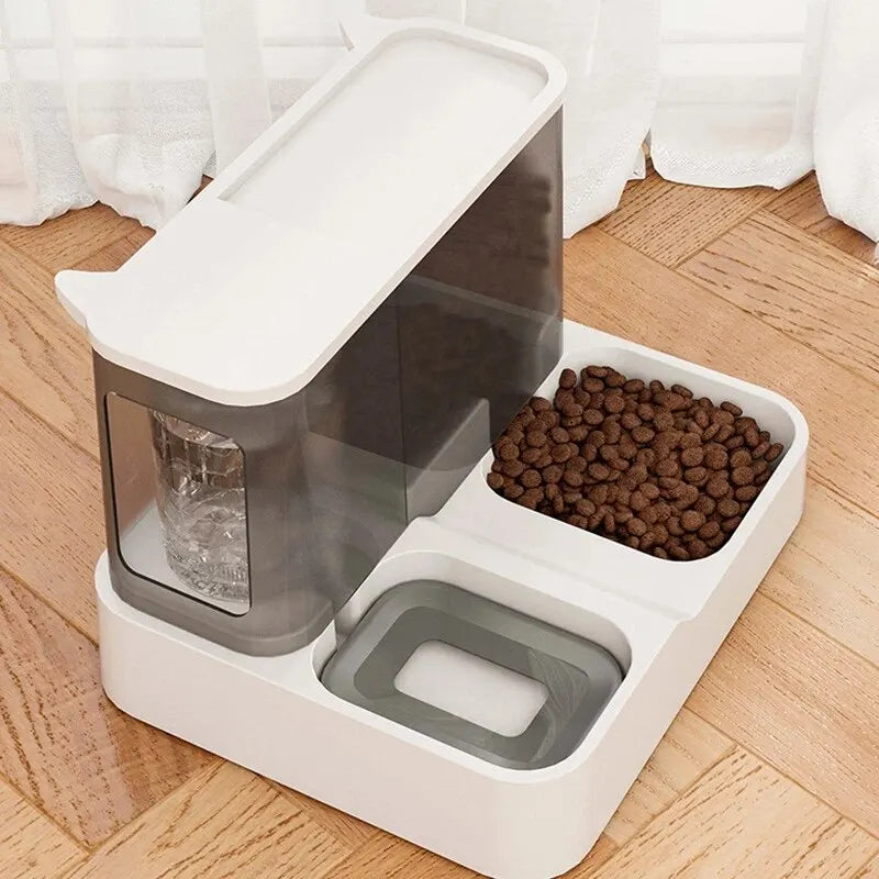 Purrfect Feeder Oasis: Automatic Pet Food & Water Station
Large Capacity Automatic Cat Food Dispenser Drinking Water Bowl Pet Supplies Wet and Dry Separation Dog Food Container